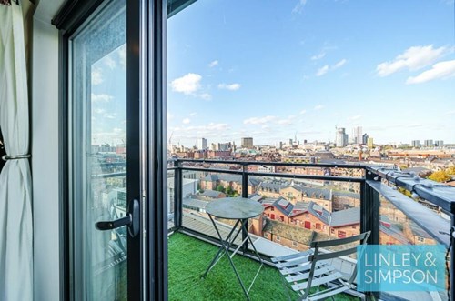 Flat balcony looking over city view