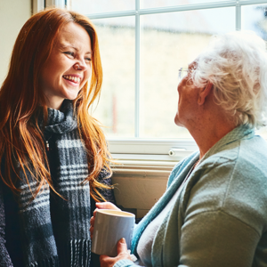 Granddaughter And Grandparent Talking
