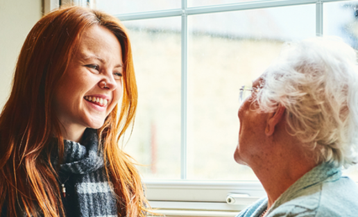 Granddaughter And Grandparent Talking